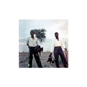 Nikolay Drachinsky. Governor’s Managers Roduan and Cambel After Successful Hunting Nearby Settlement of Dinka Tribe. Area of the City Al Manaqil, Upper Nile Province. Sudan, 1957. © Nikolay Drachinsky archive, courtesy of Alla Vakhromeeva, Archive Paper 14"x14", $500
